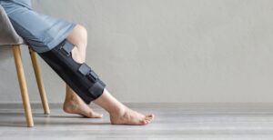 Sports medicine professional demonstrating proper acl prevention techniques