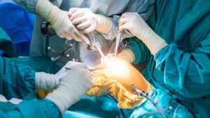 Joint replacement specialist consulting with patient about surgical options