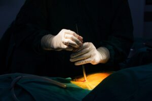 Spine specialist explaining types of minimally invasive spine surgery to patient