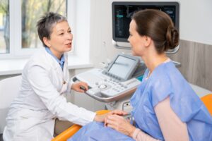 Happy mature woman demonstrating vitality from hormone replacement therapy