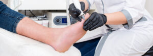 Orthopedic surgical team performing foot and ankle surgery