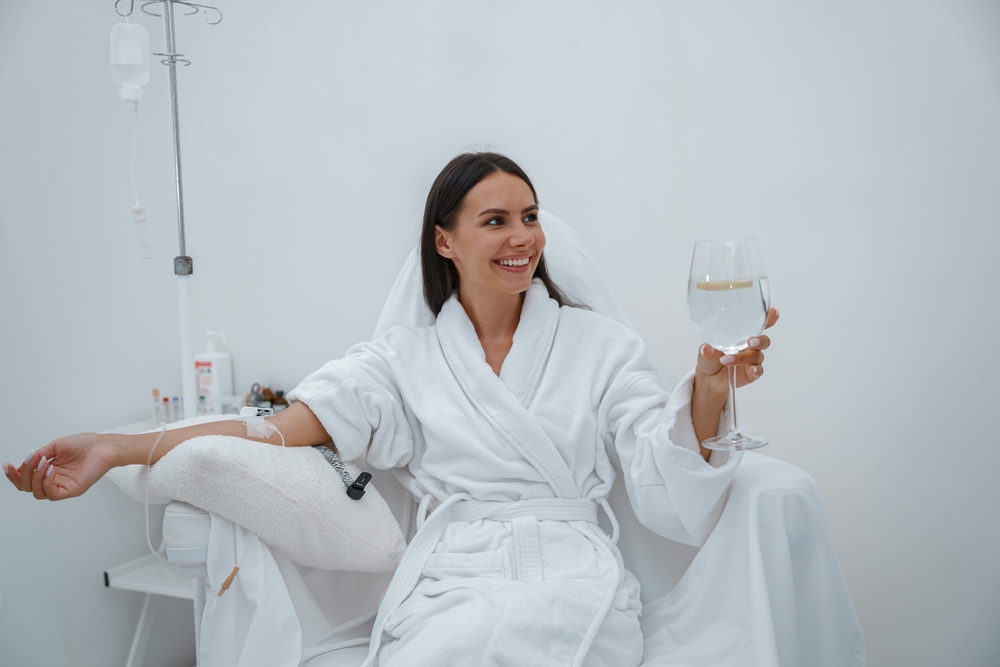 Patient enjoying IV vitamin infusion therapy session in clinical setting