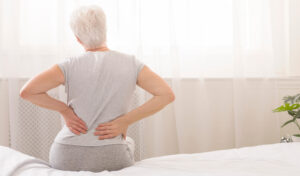 Doctor reviewing bone density results with postmenopausal patient
