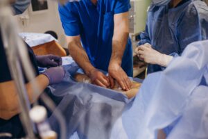 Doctor reviewing post-operative pain treatment plan with patient