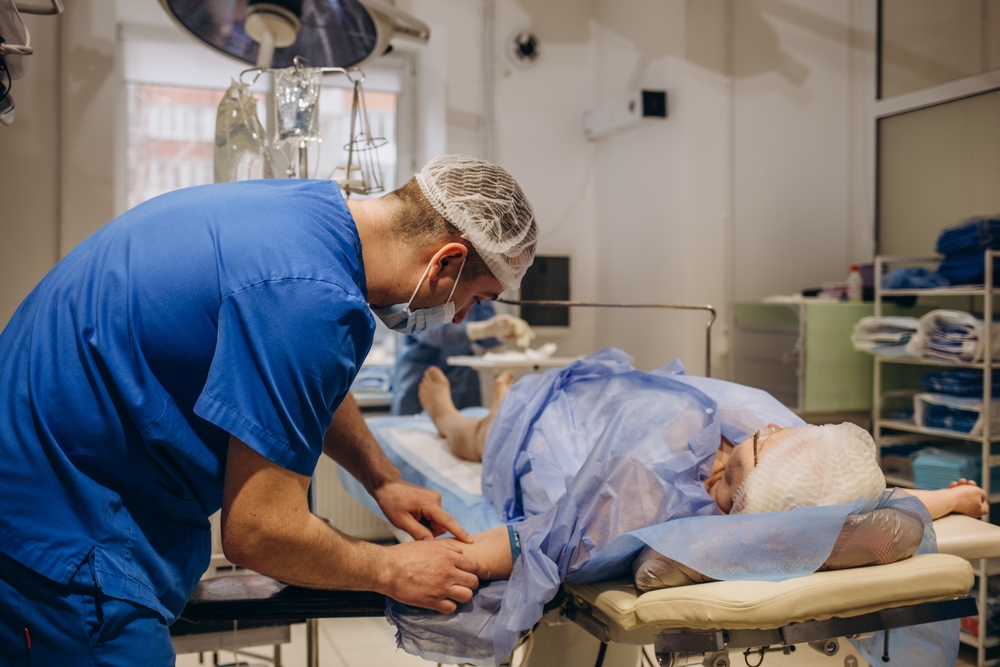 Healthcare provider consulting with patient about post surgical pain management