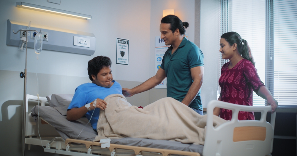 Patient performing post surgery rehab exercises with therapist supervision