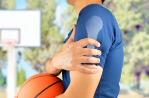 Baseball pitcher with shoulder pain from throwing injury needing evaluation