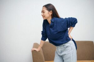 Spine specialist reviewing MRI for spinal cord compression treatment planning