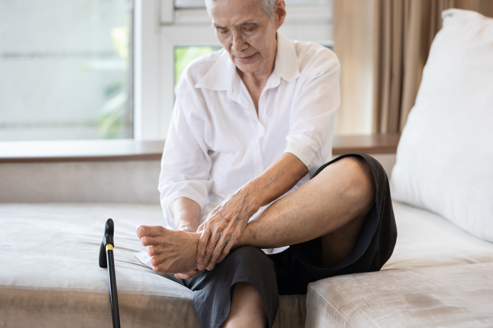 Doctor examining legs and feet for neuropathy symptoms's legs and feet for neuropathy treatment