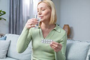 Doctor consulting with female patient about hormone therapy options