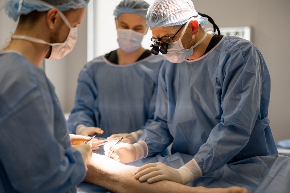 Vascular specialist reviewing diagnostic imaging with patient