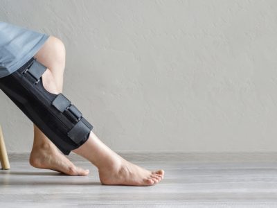 Sports medicine professional demonstrating proper acl prevention techniques