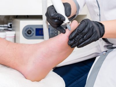 Orthopedic surgical team performing foot and ankle surgery