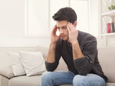 Medical professional administering Botox injection for migraine treatment