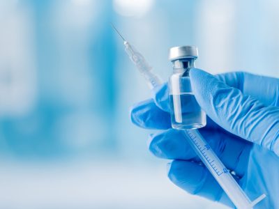 Person administering GAC lipotropic injection for weight management support