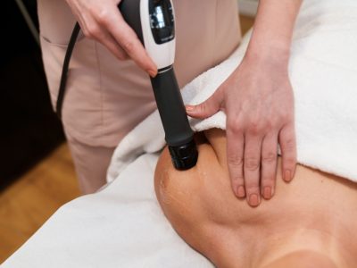 Interventional pain management doctors reviewing diagnostic imaging before treatment
