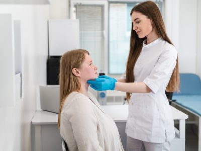 Woman experiencing fatigue and discomfort from hormonal imbalance symptoms