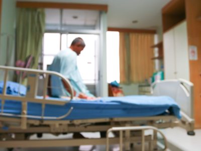 Patient performing post surgery rehab exercises with therapist supervision