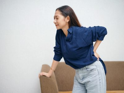 Spine specialist reviewing MRI for spinal cord compression treatment planning